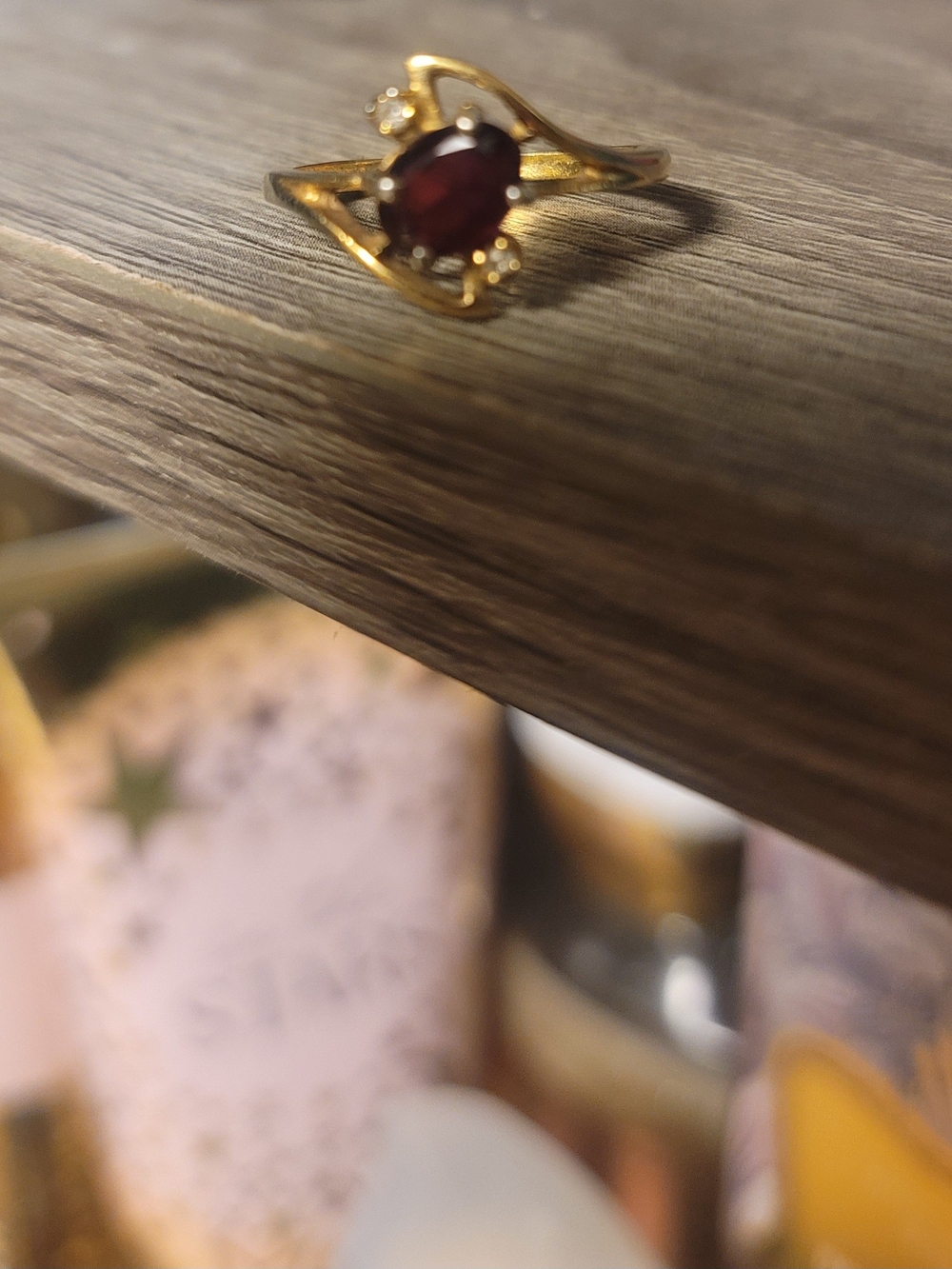 HGE Unbranded Gold-Tone Ring with Deep Red Center Stone